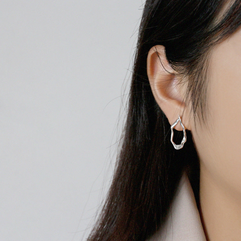 Irregular oval earrings