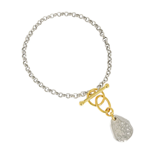 Double color bracelet with irregular charm