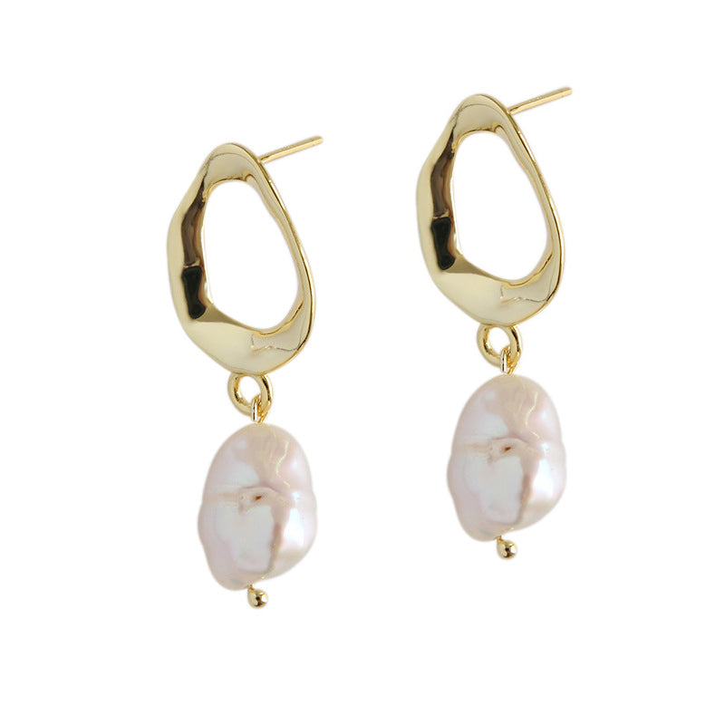 Irregular shaped earrings with cultivated baroque pearl