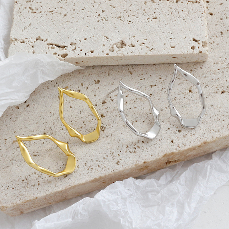 Irregular oval earrings
