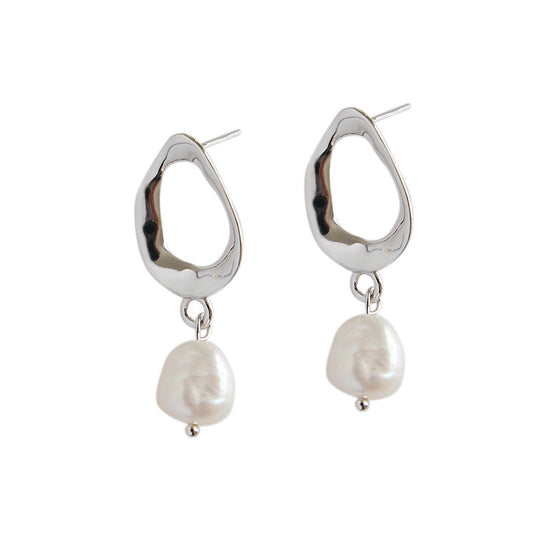 Irregular shaped earrings with cultivated baroque pearl