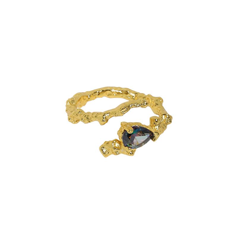 Unique organic waterdrop irregular ring with blue cubic zirconia