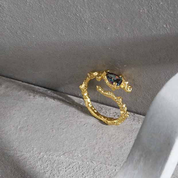 Unique organic waterdrop irregular ring with blue cubic zirconia