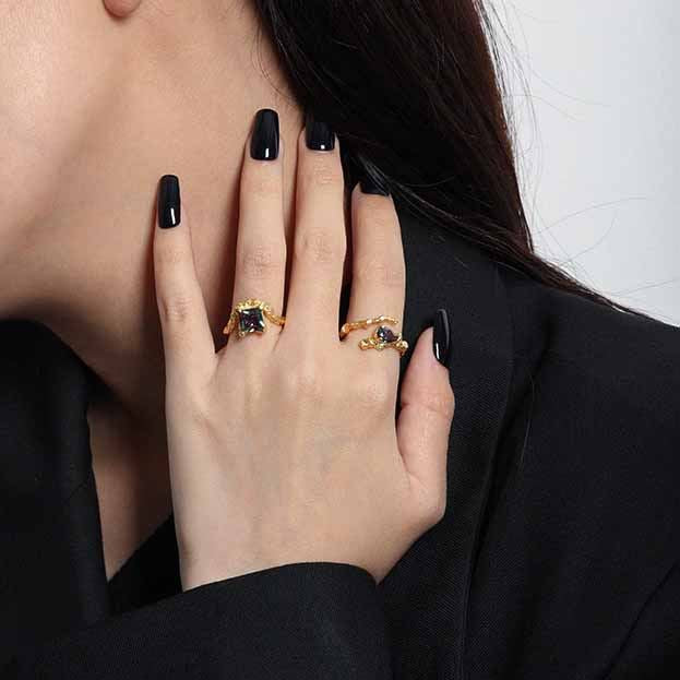 Unique organic waterdrop irregular ring with blue cubic zirconia